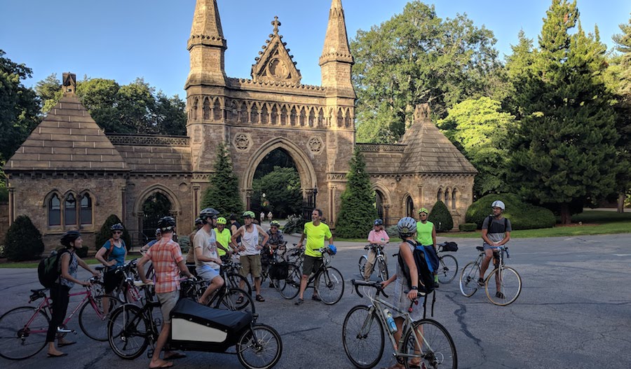 Weekly summer Landline ride, passing through the entrance to Forest Hills Cemetery in Boston, which welcomes cyclists during open hours | Photo by David Loutzenheiser