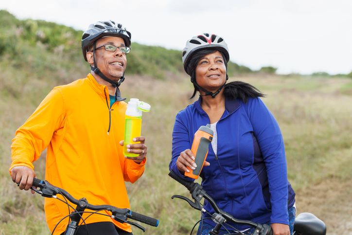 A couple taking a water break on a ride | Photo courtesy RTC