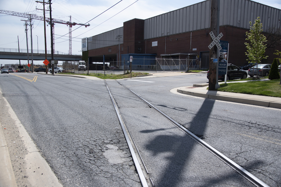 A section of future trail on an unused rail corridor in the Brewers Hill Neighborhood | Photo by Arielle Bader