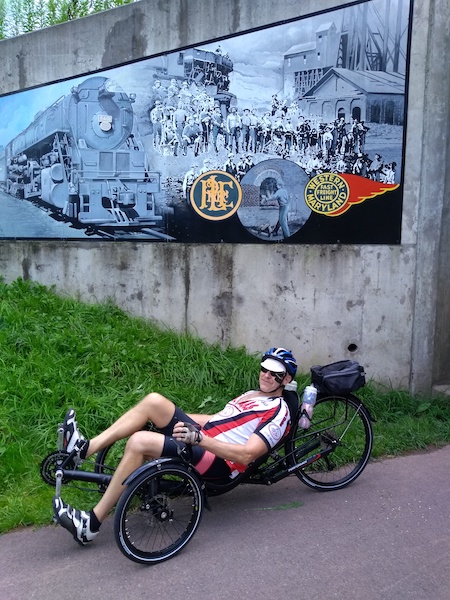 A trike user along the Great Allegheny Passage (gaptrail.org) at the Eastern Continental Divide in Meyersdale, Pennsylvania | Courtesy Allegheny Trail Alliance