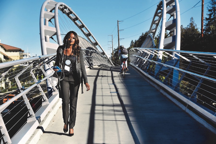A woman walks across the Robert I. Schroder Overcrossing along the Iron Horse Trail in Contra Costa County, CA. | Courtesy RTC
