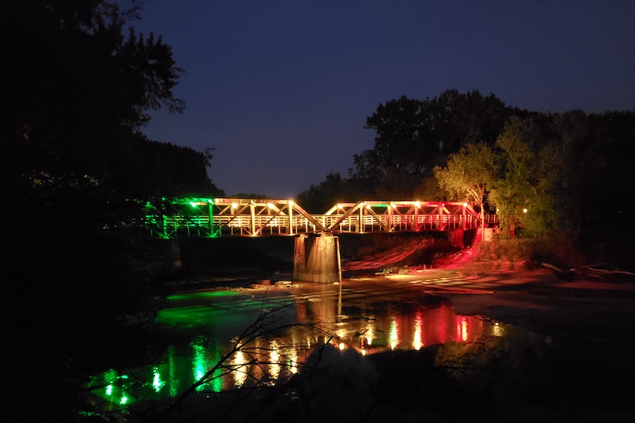 Adel's lighted bridge along the Raccoon River Valley Trail | Courtesy Adel Partners Chamber