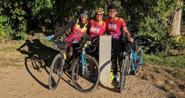 Betzy Salcedo, Brenda Hamilton and Kathleen Richardson at the end of a ride from Pittsburgh to Washington, D.C., via the Great Allegheny Passage and C&O Canal Towpath. | Photo by Joseph Richardson