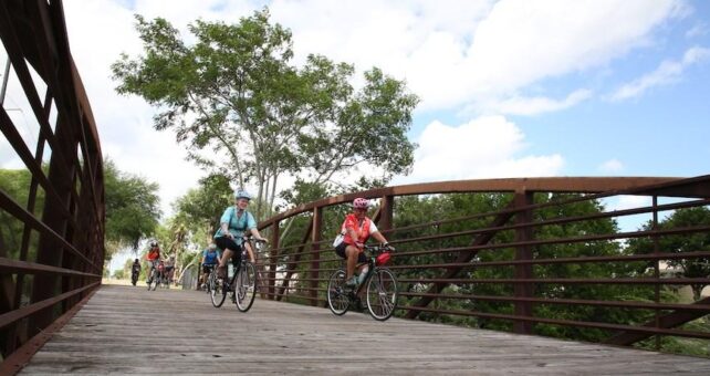 Bikers on tour of Caracara Trails | Photo by John Faulk, Frontera Media