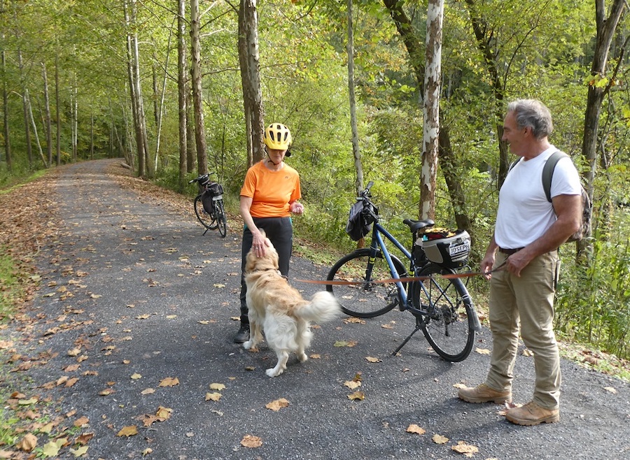 Carol Walter sharing dog biscuits with a new furry friend | Photo courtesy Joe Rebar