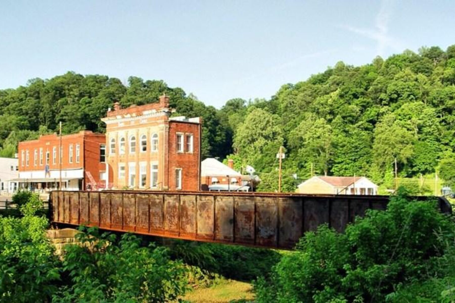 Former B&O Railroad bridge along the North Bend Rail Trail leading to the quaint town of Cairo, West Virginia | Photo by Mike Tewkesbury