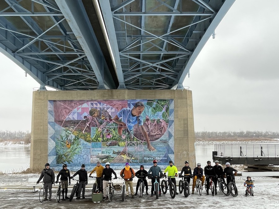 Group ride photo in front of the Missouri River Heritage Mural | Photo courtesy Northern Plains National Heritage Area and Missouri Valley Heritage Alliance-Fort Abraham Lincoln Foundation