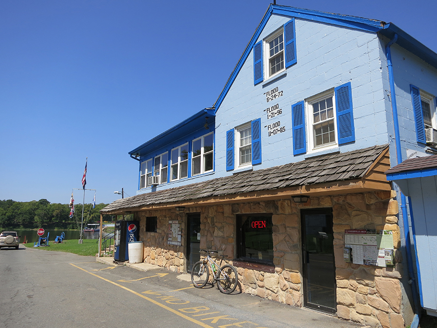 Historic flood lines on the Whites Ferry Store & Grill along the C&O Canal Towpath in Maryland | Photo by Neil Arnold