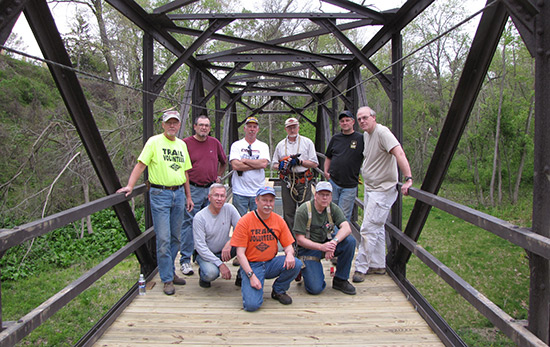 Montour Trail Volunteers pose for a photo after completing decking installation on a bridge in South Park | Photo by David Oyler