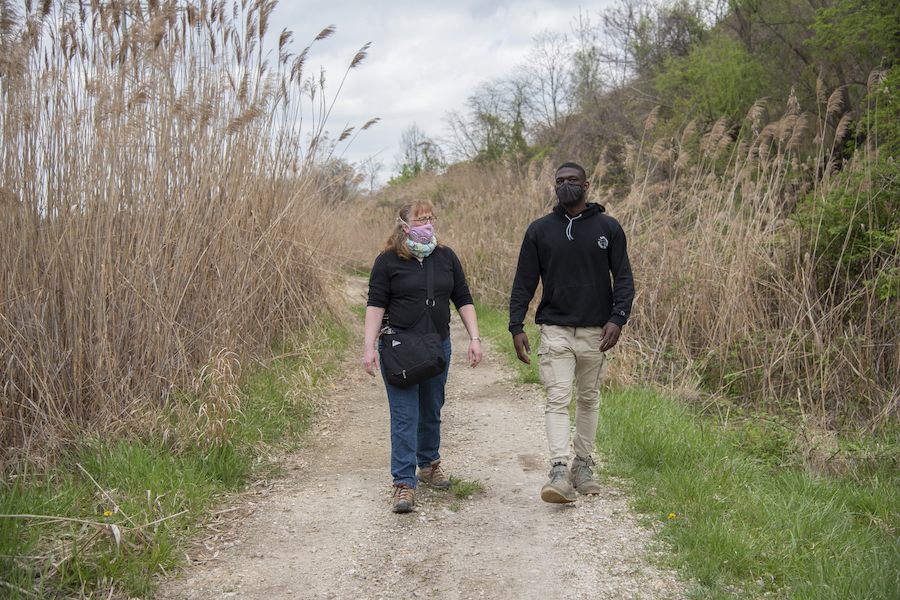 Patty Dowd and Ethan Abbott walk on the BGE Utility Corridor, a critical gap of future trail | Photo by Arielle Bader