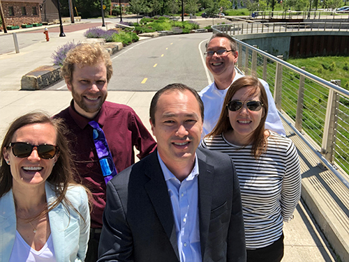 Rails-to-Trails Conservancy President Ryan Chao (middle) with fellow staff, including (left to right) Kelly Pack, Eric Oberg, Brian Housh and Alisa Borland, in Cleveland, Ohio. | Photo courtesy RTC