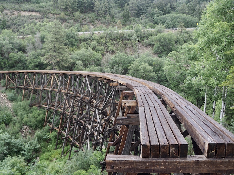 Restoration work took place in 2009/2010 on the 1899-era Mexican Canyon Trestle in Lincoln National Forest. The trestle is part of the Alamogordo and Sacramento Mountain Railway’s 7.5-mile extension from Toboggan Canyon to Cloudcroft and Russia Canyon. According to a sign at the site, the final section of the railroad rose 2,000 feet and included 27 major timber trestles. | Photo by Cindy Barks