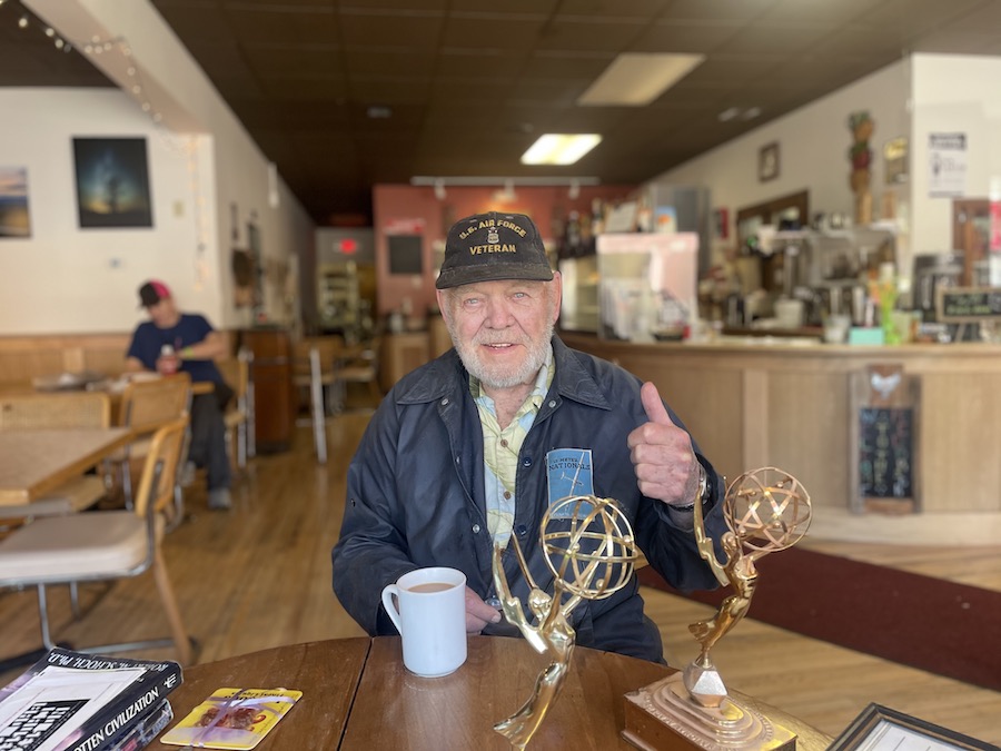 Rudy with his two Emmys at Cafe Rosalia in Washington | Photo courtesy Shevonne and Pat Travers
