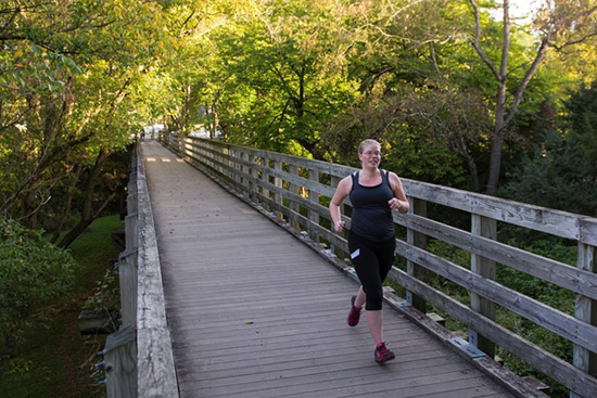 Sarah Young runs in the morning on the Virginia Creeper Trail in Abingdon, Va. | Photo by Tyler Evert:AP Images