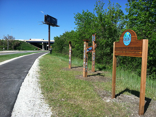 Signage and public art along the KK River Trail | Photo courtesy of Sixteenth Street Community Health Centers