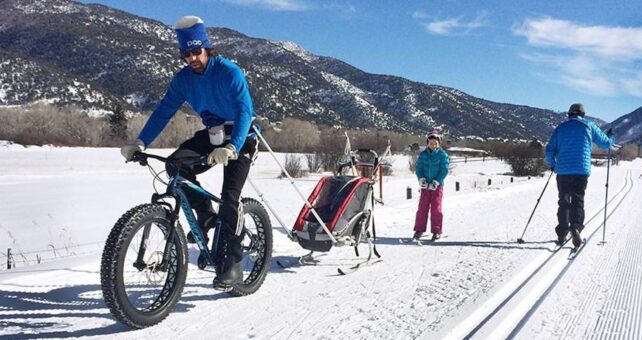 Snow biking and skiing on the Rio Grande Trail near Basalt, Colorado | Photo courtesy Pitkin County Open Space and Trails