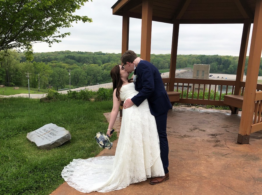 Spencer Roudabush and Beth Summerson on their wedding day at Iowa's Coralville Lake | Photo by Cece Roudabush
