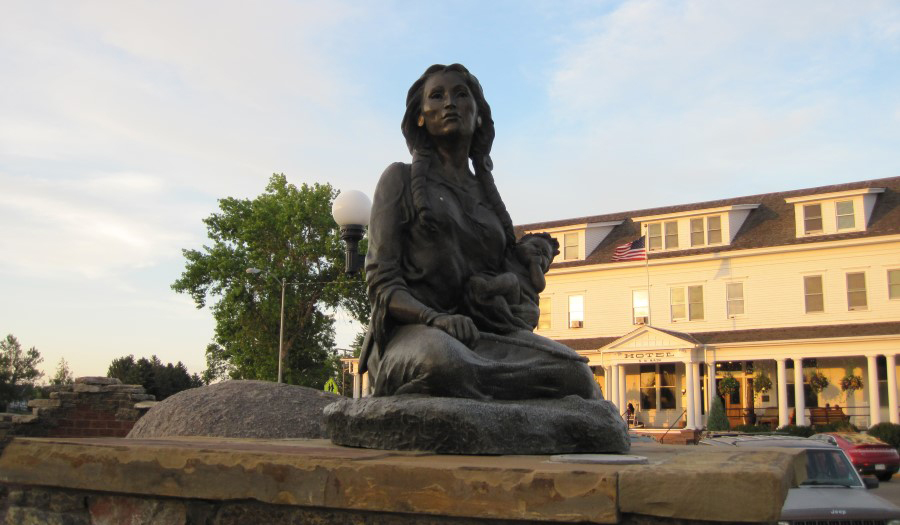Statue of Sacajawea in Sacajawea Park near the Headwaters Trail System in Three Forks, Montana | Photo by Emmett Cartier, Greater Glory Flickr Page