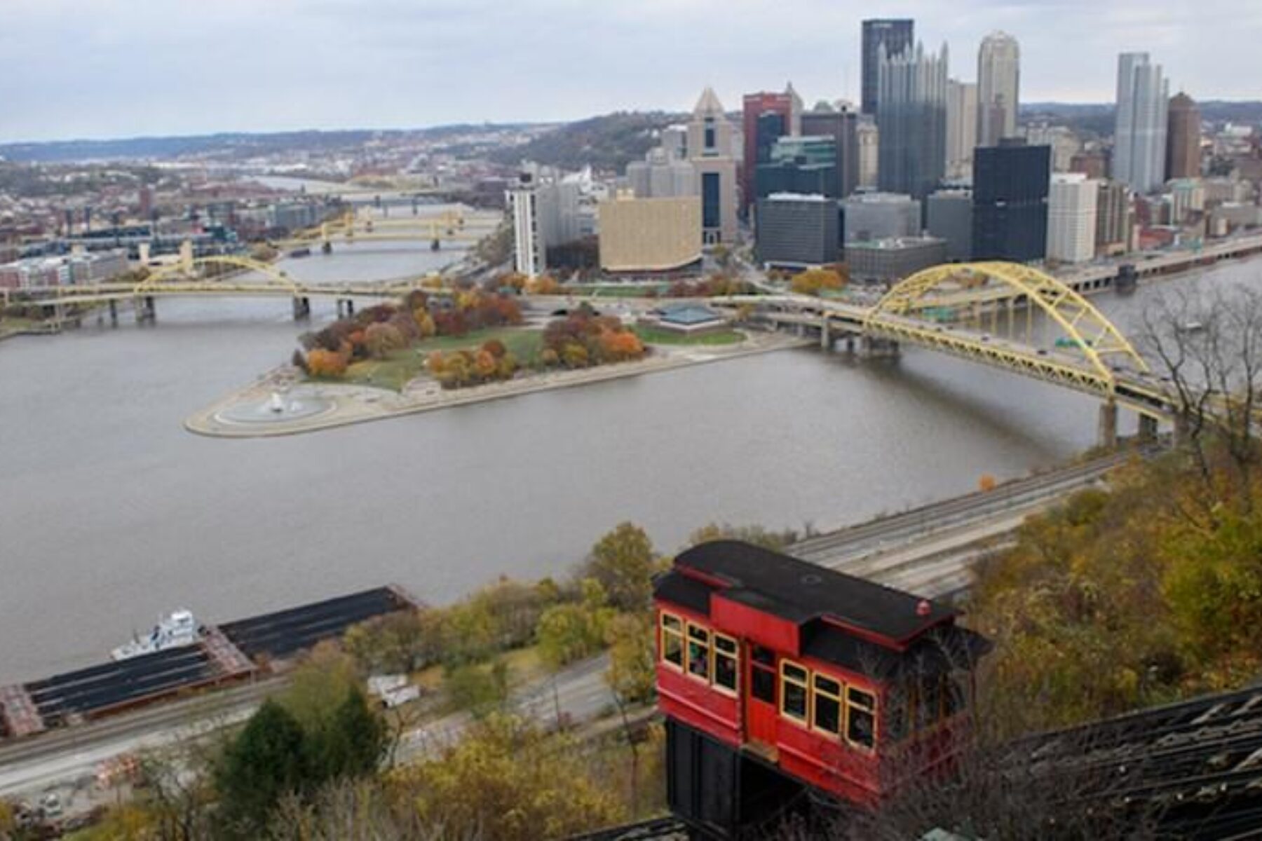 The Duquesne Incline moves along the Mt. Washington hillside overlooking Downtown, Pittsburgh and the Three Rivers Heritage Trail. | Photo by Justin Merriman