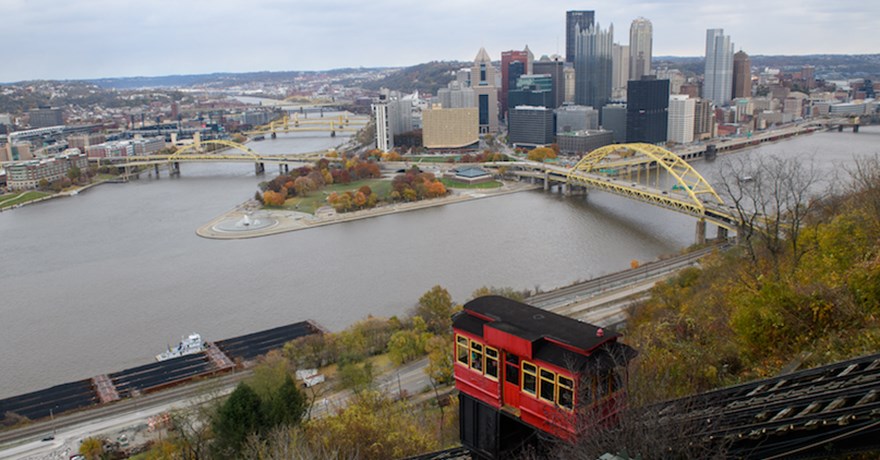 The Duquesne Incline moves along the Mt. Washington hillside overlooking Downtown, Pittsburgh and the Three Rivers Heritage Trail. | Photo by Justin Merriman