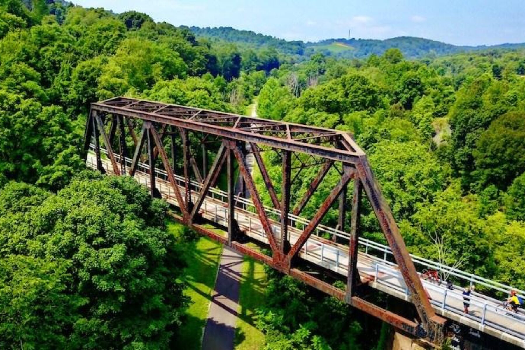 The Panhandle Trail passes beneath a trestle on the Montour Trail | Photo by Milo Bateman