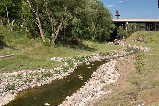 The river restoration involved removing the concrete that lined the channel and replacing it with natural stone. | Photo by Christopher Zaborsky