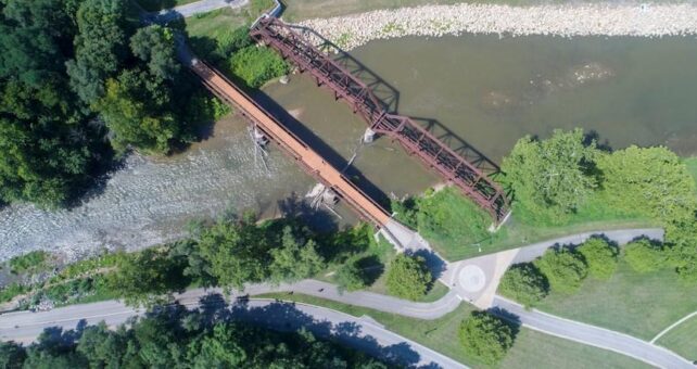 Trail crossing over the White River along the Cardinal Greenway near the McCulloch Riverview Trailhead in Muncie, Indiana | Photo by Tony Valainis