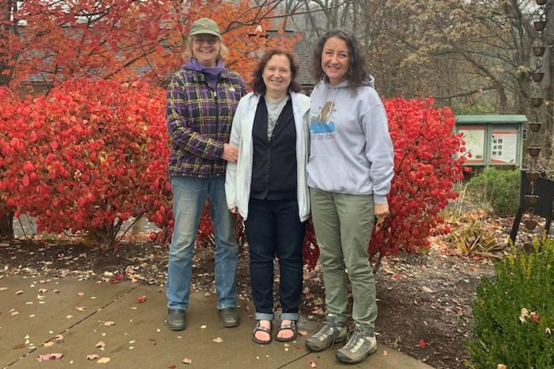 As part of the conference program, longtime West Virginia trail advocates Peggy Pings, Ella Belling and Amanda Pitzer celebrate Ella’s recognition as a leader of trail advocacy on the Mon River Rail-Trail System in Morgantown. | Photo courtesy Amanda Pitzer