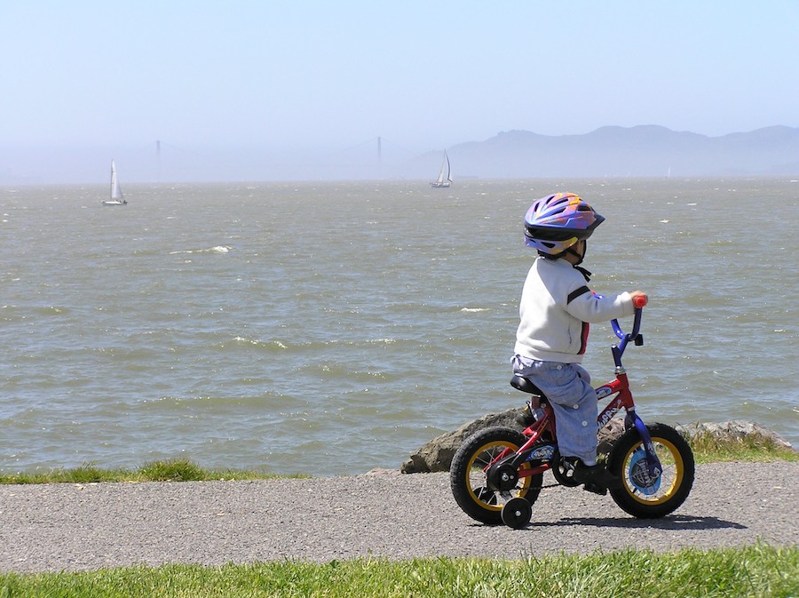 A child rides their bike along the Perimeter Trail in Cesar E. Chavez Park in Berkeley, CA. | Photo courtesy Lee Huo, SF Bay Trail Project