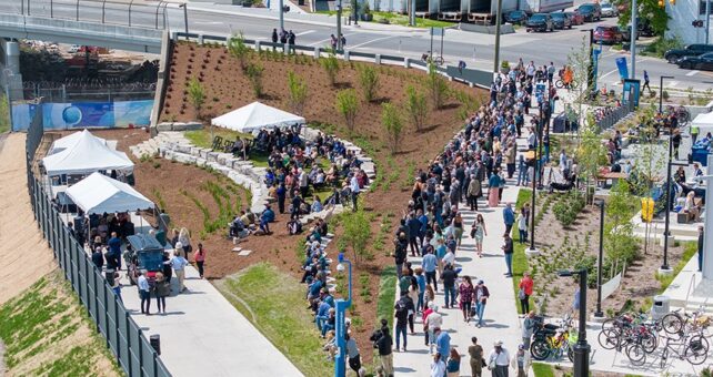 Large crowd celebrating the opening of Michigan's southwest greenway