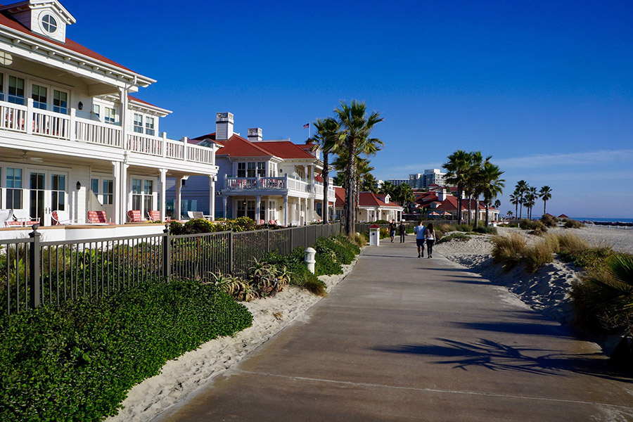 The historic Hotel del Coronado sits just steps from Coronado Island’s Bayshore Bikeway, which runs along the bay side of the narrow island. The oceanfront path that fronts the 1888-era hotel offers a scenic detour for bikeway runners, walkers and cyclists. | Photo by Cindy Barks