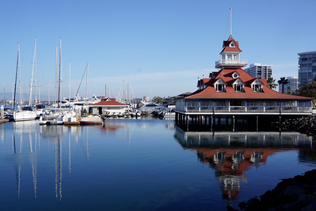 The Bluewater Boathouse is among the pretty sights greeting users of the Bayshore Bikeway as it traverses the edge of Glorietta Bay along Silver Strand Boulevard. | Photo by Cindy Barks
