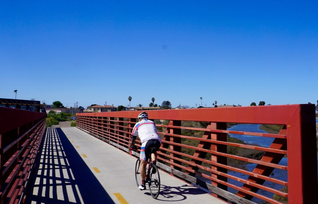 A bridge near the Bikeway Village commercial center in Imperial Beach takes Bayshore Bikeway users across a section of the San Diego Bay National Wildlife Refuge. | Photo by Cindy Barks