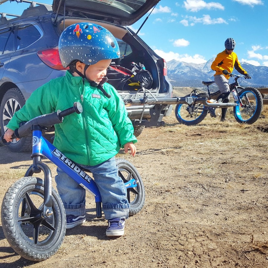 Child and adult on Strider bikes - Photo courtesy of Strider Bikes