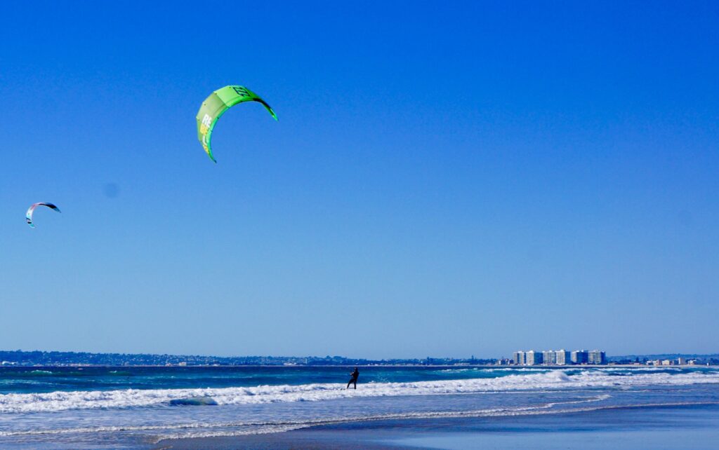 Silver Strand State Beach on the western edge of Coronado Island attracts dozens of wind surfers on sunny, gusty days. The state beach can be accessed from the Bayshore Bikeway, which runs along the eastern side of the island. | Photo by Cindy Barks