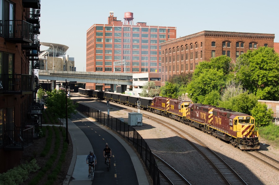 Bicyclists on Minneapolis' Cedar Lake Trail with Target Field in the background | Photo by Flickr user AndyMoose