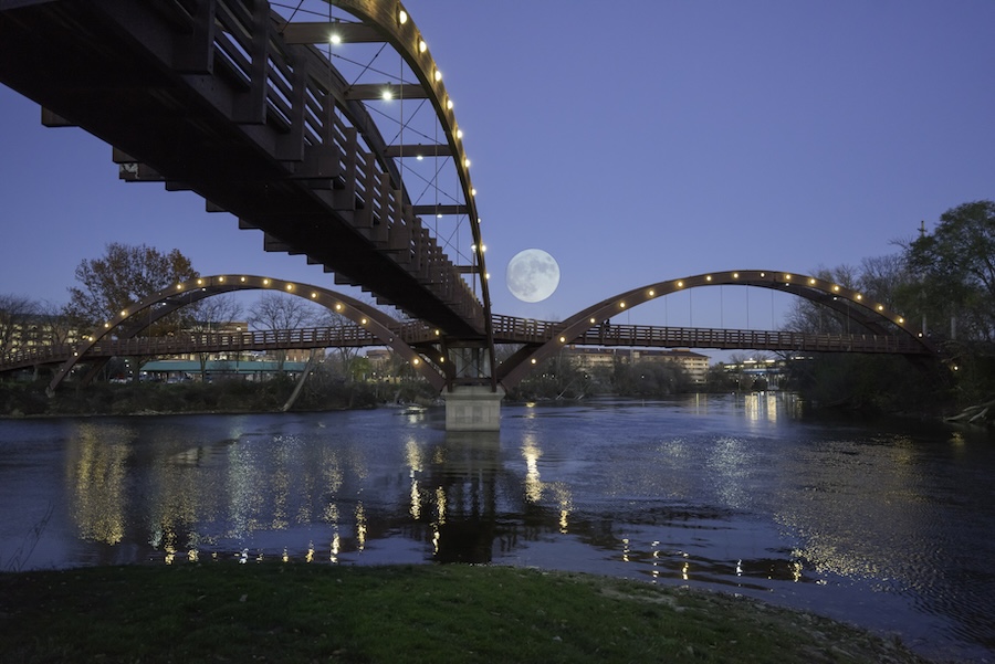 The Tridge, created in 1981 and one of Midland’s main attractions, is a wooden footbridge in Chippewassee Park spanningthe confluence of the Chippewa and Tittabawassee rivers and comprising three 180-foot-long spokes. It also connects to the 3.5-mile Chippewa Trail. Photo by Charles Bonham