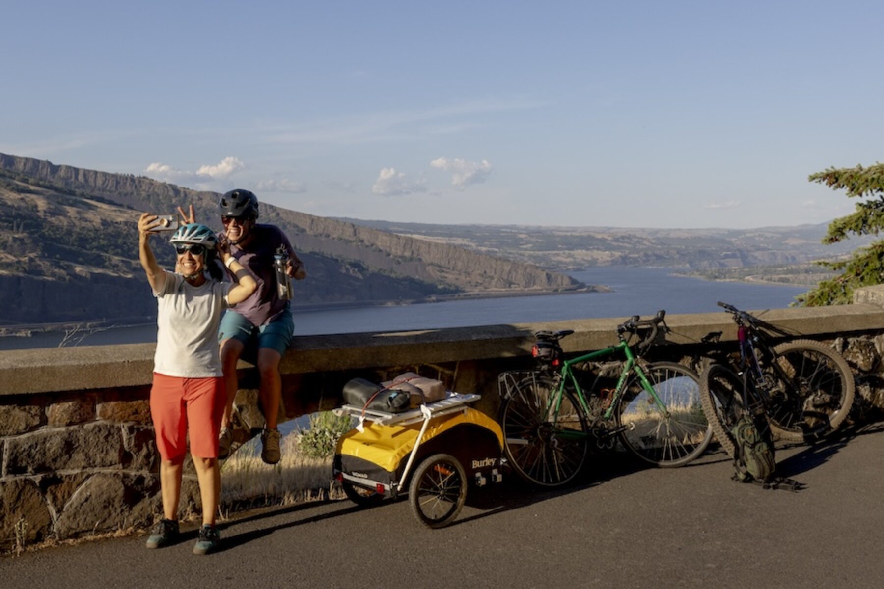 2 people taking selfie with cargo bikes | Photo courtesy of Burley