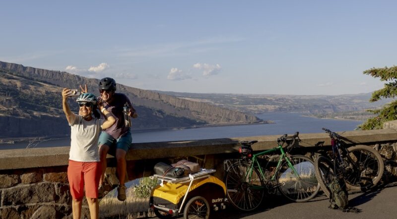 2 people taking selfie with cargo bikes | Photo courtesy of Burley