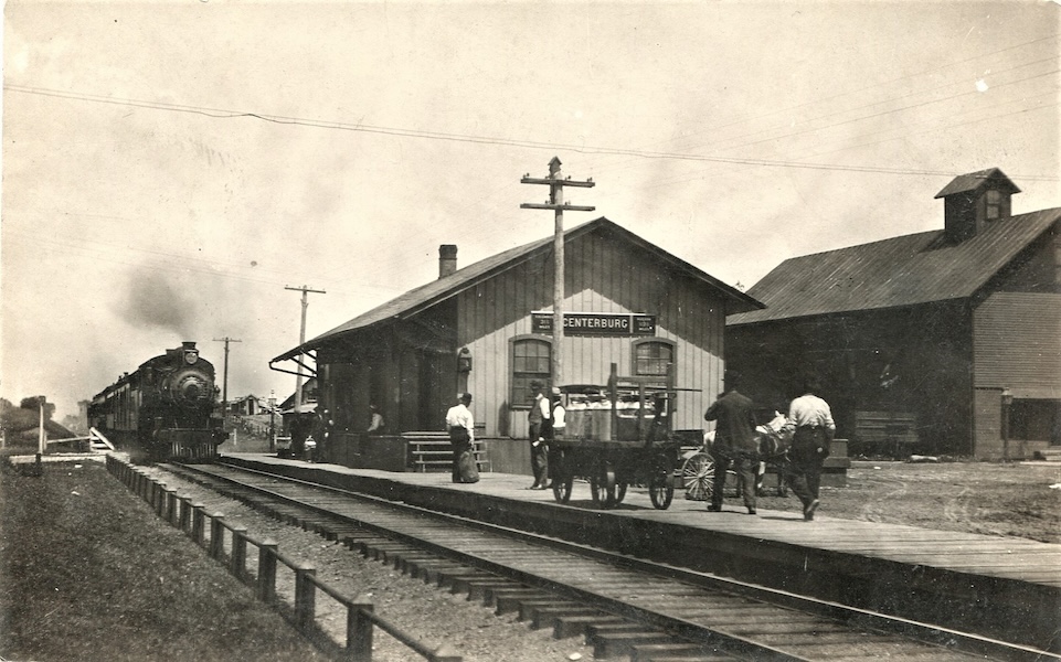 Circa 1908: Train arriving at the Centerburg CA&C depot with the Alsdorf mill in the background | Courtesy Gloria Parsisson