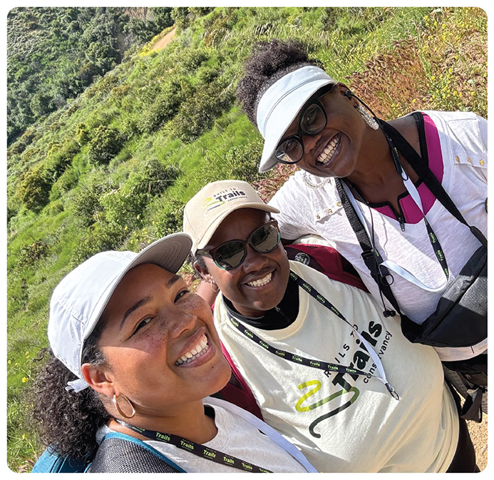 Photo by @brandihikes, (center) celebrating along the Skyline Drive Trail in Corona, California