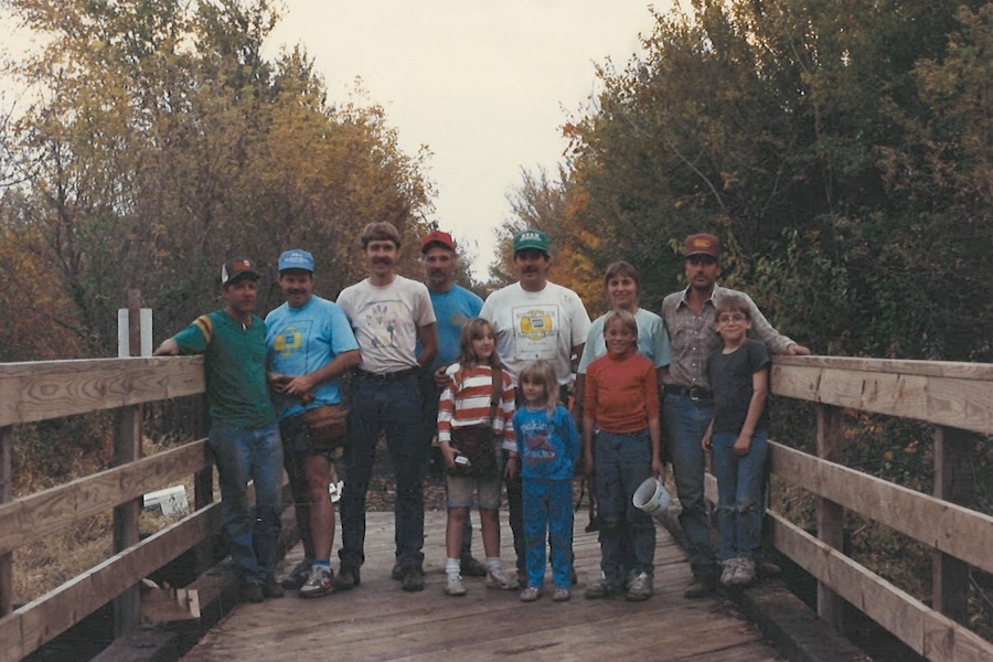 Volunteers and their families on the Tarkio River bridge on Iowa's Wabash Trace Nature Trail in the 1990s | Photo courtesy Bill Hillman