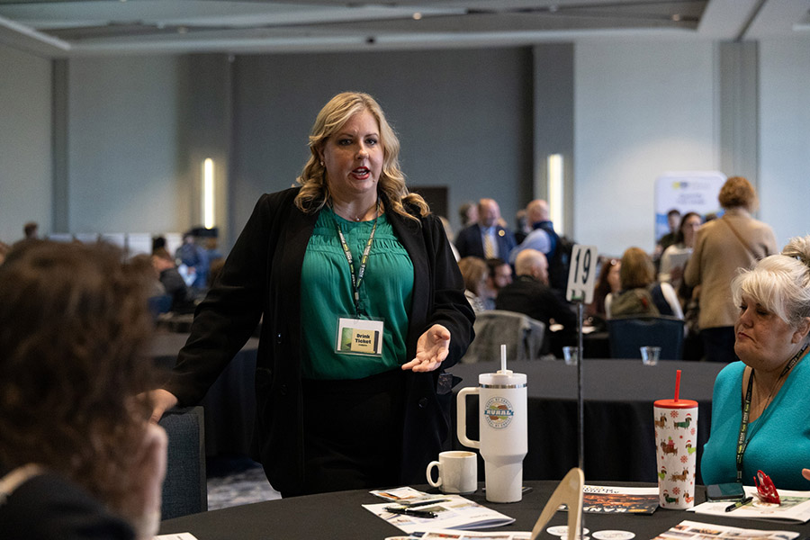 Trisha Purdon of the Kansas Office of Rural Prosperity on the links between outdoor recreation and rural prosperity at the World Café. | Photo by Dave Pelosi, Clum Creative