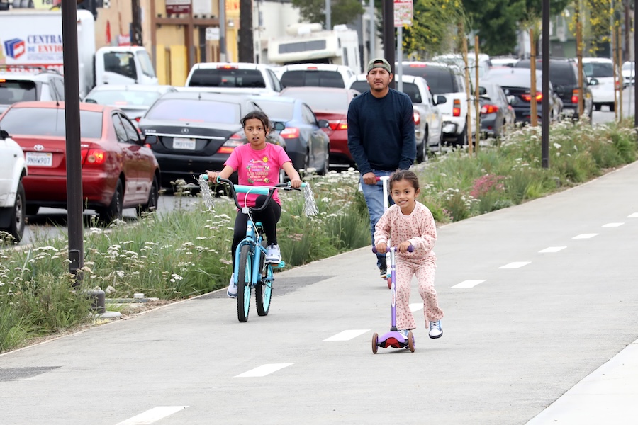 Family on bikes and scooters along California's Rail to Rail Path | Photo courtesy LA Metro