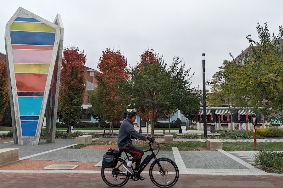Bicyclist and trail art along Indiana's Monon Trail in Carmel | Photo by Laura Stark