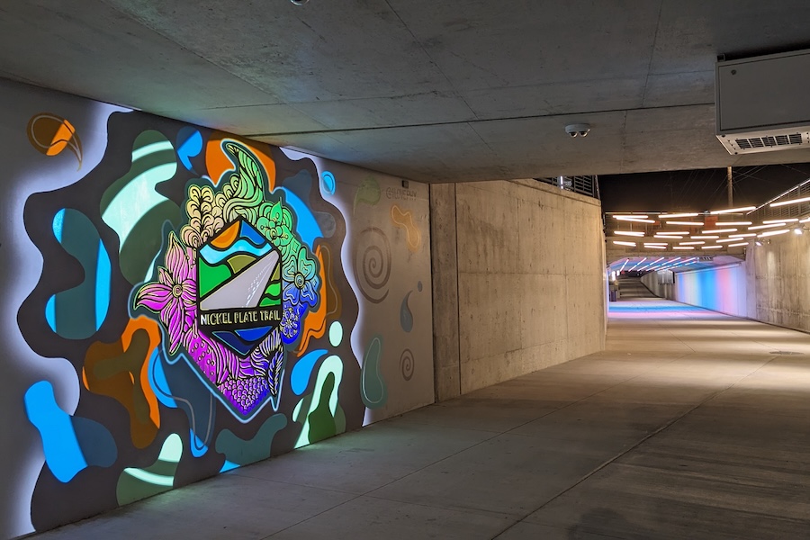 Art and trail sign along Indiana's Nickel Plate Trail tunnel in Fishers | Photo by Laura Stark