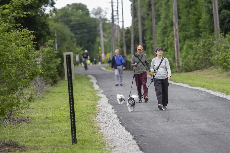 Dogwalkers on New Jersey's Pompton Valley Rail Trail ribbon-cutting ceremony | Photo by Karen Mancinelli, courtesy County of Morris