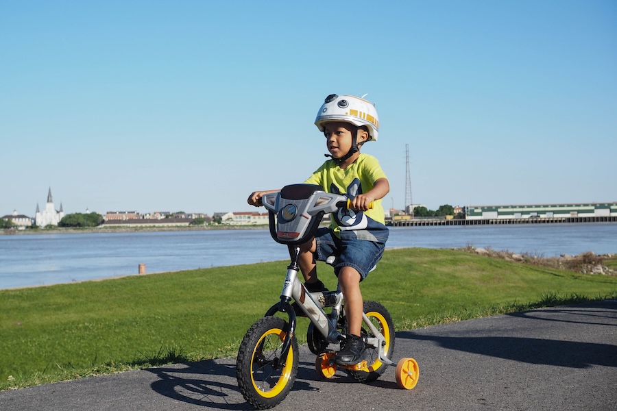 Child on tricycle along Louisiana's Mississippi River Trail | Photo by Thomas N. Chapin, courtesy Bike Easy