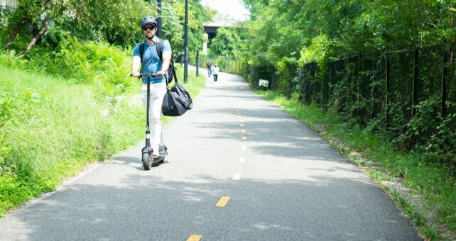 Active transportation - E-scooter user on D.C.'s Metropolitan Branch Trail | Photo by India Kea