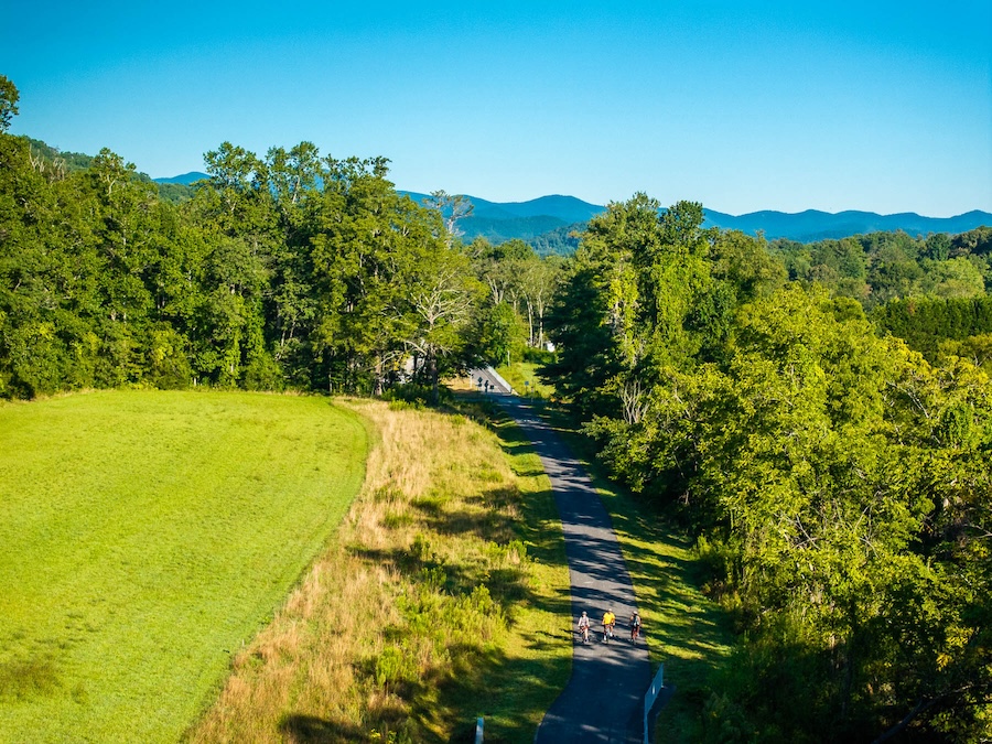 Bicyclists ride the Ecusta Trail in Hendersonville, NC | Photo by Derek DiLuzio, courtesy Visit Hendersonville
